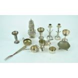 A silver plated sugar sifter and other items