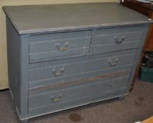 An antique Victorian chest of drawers with two short over three long drawers, painted in grey,