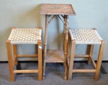 Two stools and a bamboo plant stand