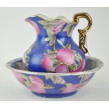 A 19th century style wash bowl and jug