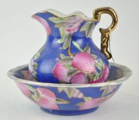 A 19th century style wash bowl and jug