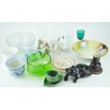 A green glass bowl and other items