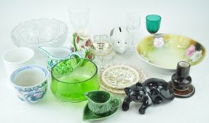 A green glass bowl and other items