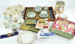 A collection of assorted commemorative wares,