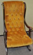 An antique style resin rocking chair