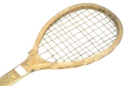 A Children's vintage tennis racquet, un-marked,