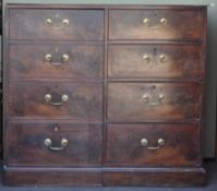 A 19th Century mahogany chest combination consisting of a run of four drawers adjacent to a faux