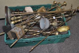 A quantity of brass fire irons and other metalware