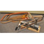 A mitre saw and various other tools