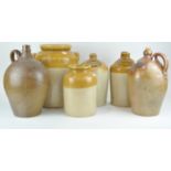 A collection of stoneware cider jars, 38cm high,