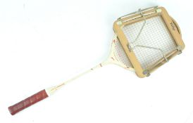 A Slazenger 'Flight Commander' badminton racquet, with Dunlop press,