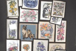 A group of framed embroideries and other items