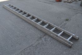 An Aluminium and wood double ladder