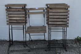 Six folding garden chairs