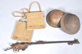 A collection of assorted WWII Second World War items to include; two British steel brodie helmets,
