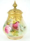 A Royal Worcester blush ivory lobed baluster pot pourri, decorated with roses,