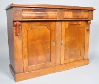 A Victorian mahogany chiffonier with two frieze drawers above two panelled doors on plinth base,