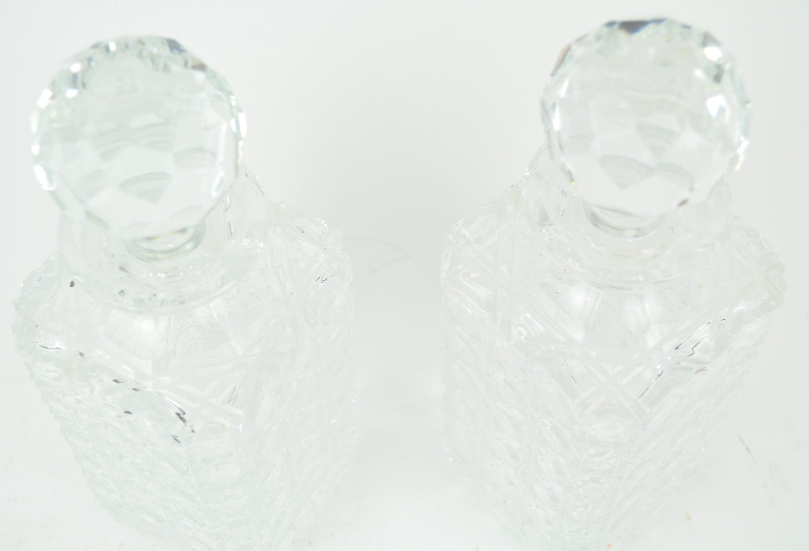 A pair of cut glass square decanters and stoppers, each with a star cut base, - Image 2 of 2