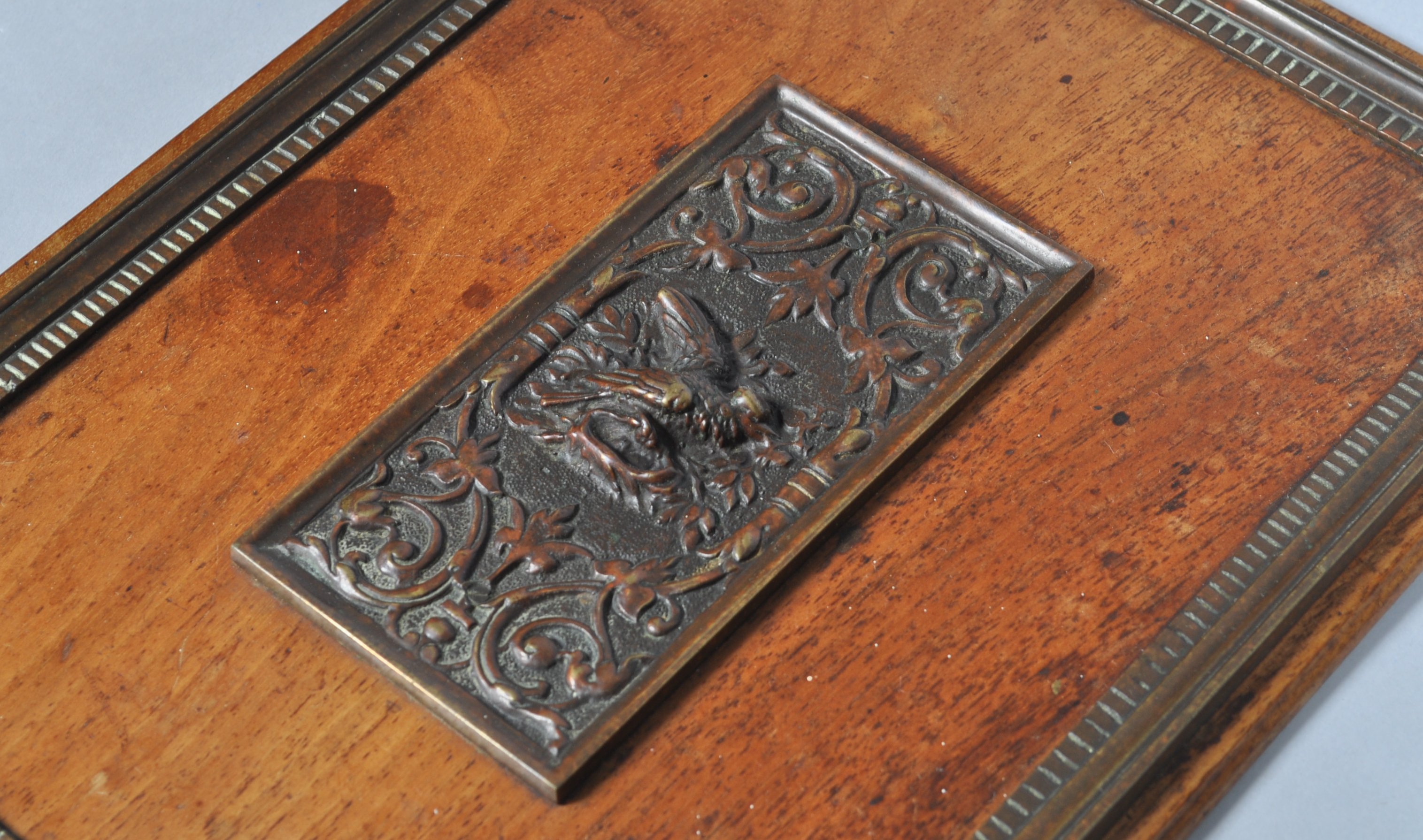 A mahogany panel with central bronze relief and frame, - Image 2 of 2