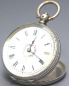 An 800 silver cased open face pocket watch. White ceramic dial with central floral design.