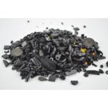 A large collection of jet beads of varying design,