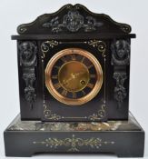 A Victorian slate and marble mantel clock, with applied bronze patinated mask mounts,