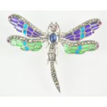 A white metal dragonfly brooch/pendant.