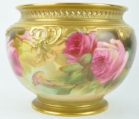 A Royal Worcester blush ivory planter of massive form, decorated with roses and with a pierced lid,