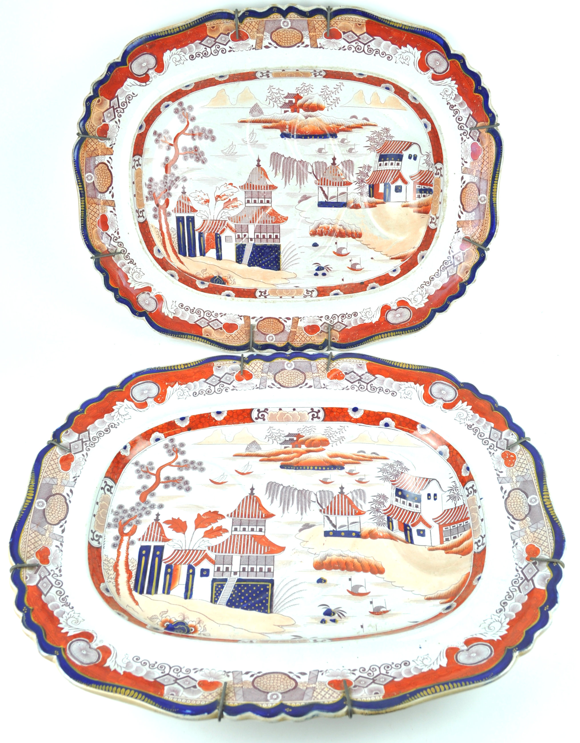 A 19th century pair of Mason's 'Real Stone China' meat plates with gravy well,