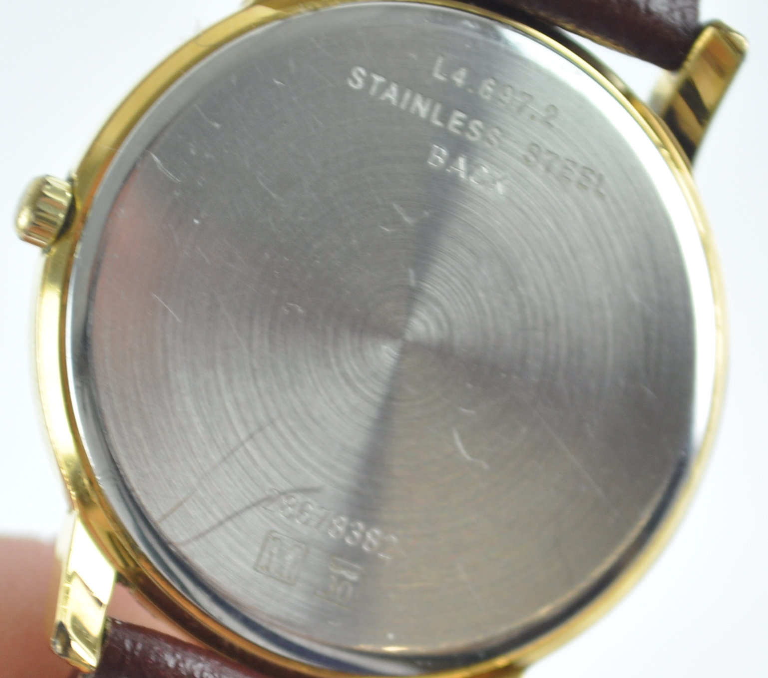 A gold plated Longines quartz wristwatch. Circular dial with numerical markings and date feature. - Image 5 of 5