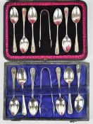A cased set of six Old English pattern teaspoons and a pair of sugar tongs,