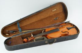 A violin in a 19th century ebonised case,