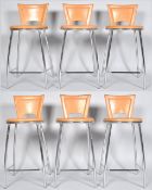 Mathias - A set of six contemporary Italian bar stools having a chromed tubular construction with