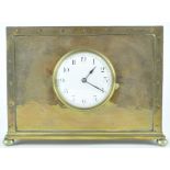 A mantle clock, the enamelled dial in rectangular copper and brass case on bun feet,