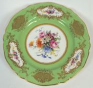 A Royal Worcester Sevres style cabinet plate with a central polychrome floral panel of roses,