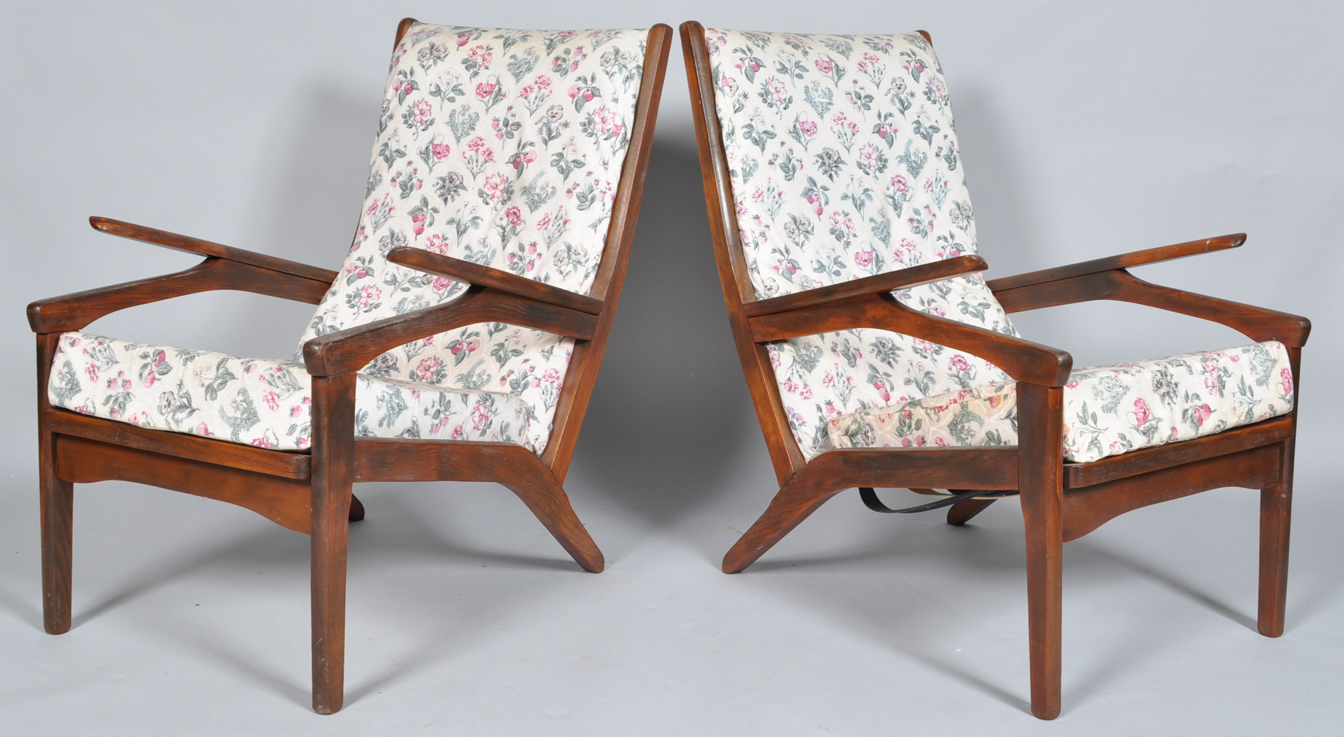 An unusual pair of 1960's Danish inspired retro vintage teak wood easy / lounge chairs / armchairs