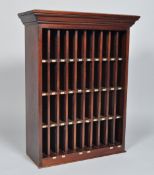 A late 20th Century vintage mahogany letter box having forty one individual sections with a flared