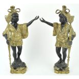 A pair of bronze figures of Blackamoors, in 18th century Venetian style,