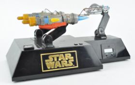 A Star Wars animated clock figure of Anakin Skywalker,