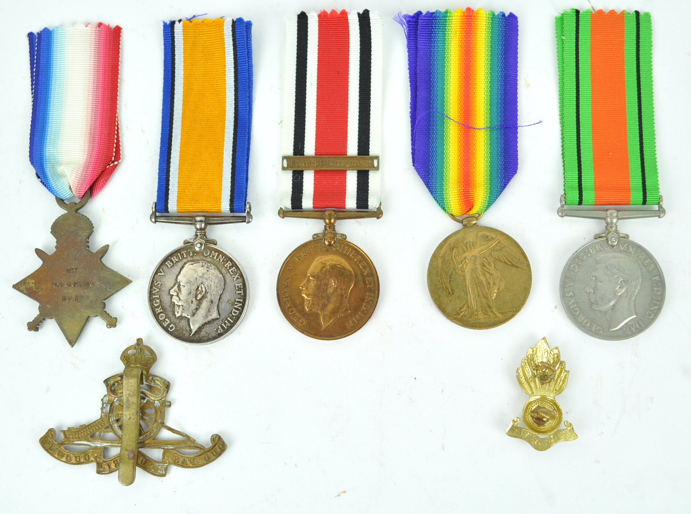 A WWI and WWII Medal group to 827 Dvr G Mann, RFA/974 Dvr G Mann RA, comprising the 1914-15 Star, - Image 2 of 2