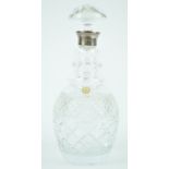A Bleikrystall cut glass decanter and stopper, with silver mounted top and star cut base,