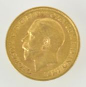 A gold half sovereign, dated 1911.