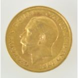 A gold half sovereign, dated 1911.