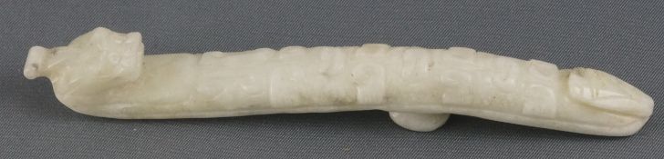 A carved Chinese pale celadon jade belt hook,