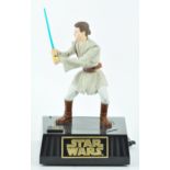 A Star Wars animated interactive figure money box of Obi-Wan Kenobi,