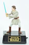 A Star Wars animated interactive figure money box of Obi-Wan Kenobi,