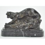 A bronze model of a tiger, after Antoine Louis Barye, on black marble plinth,