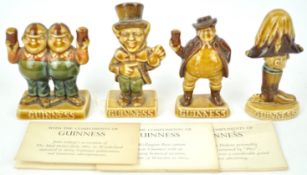 A boxed group of four Guinness promotional figures, being the Duke of Wellington, Sam Weller,