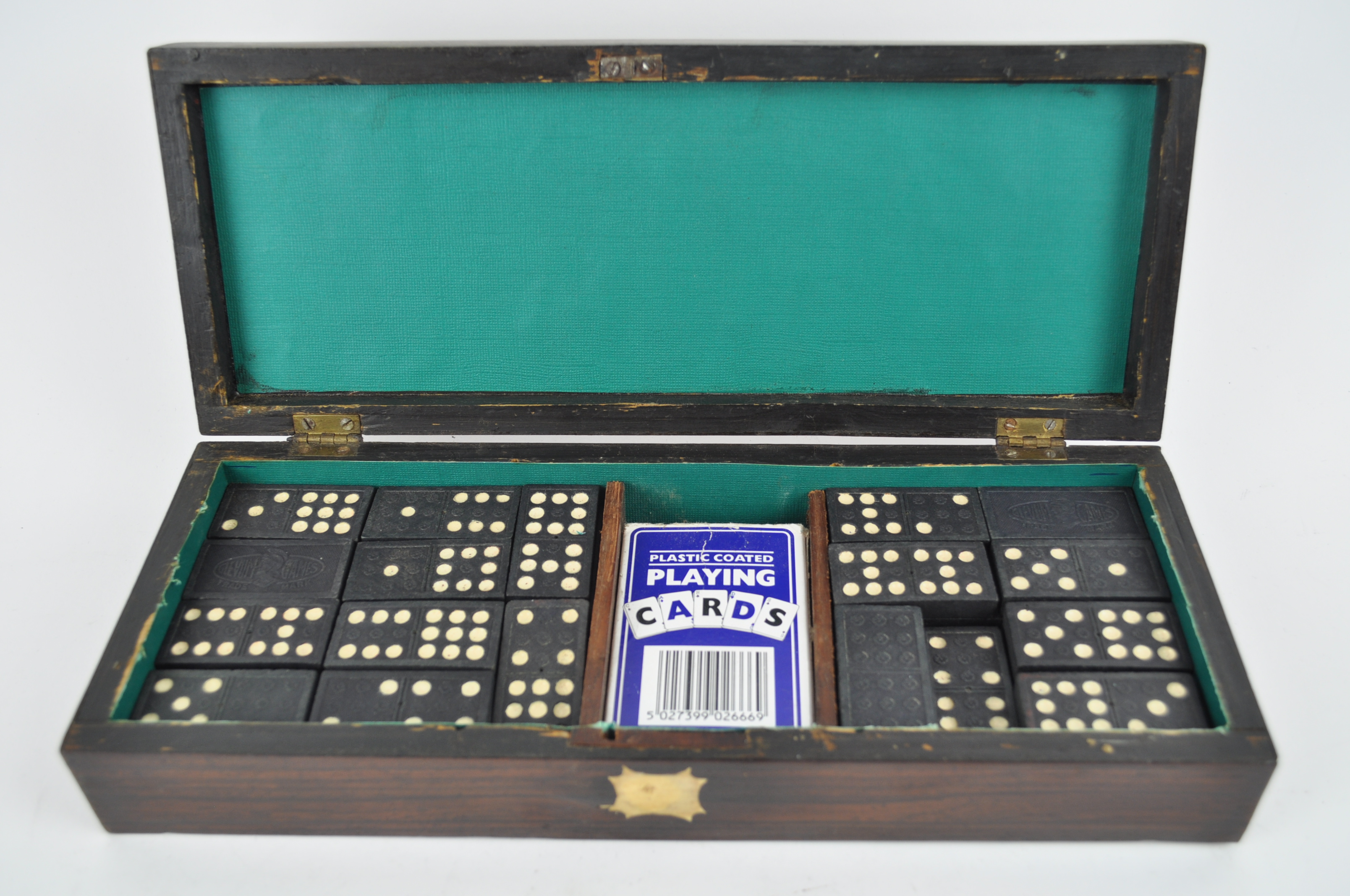 A rosewood and brass inlaid box containing a set of dominoes and playing cards,