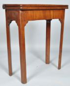 A George III mahogany card table, of small form on square legs,